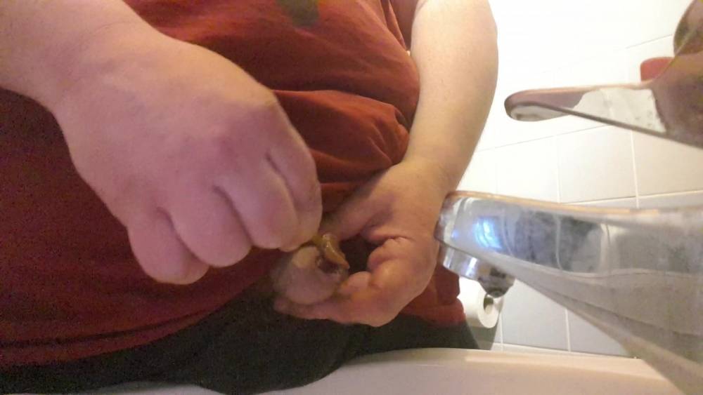 Dipping toffee lollipop under foreskin and cumming - xhamster.com