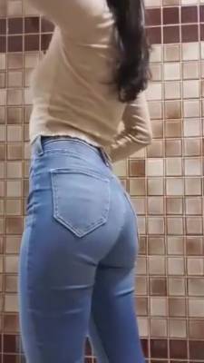 Showing Off Her Ass In Tight Denim Jeans - hclips.com