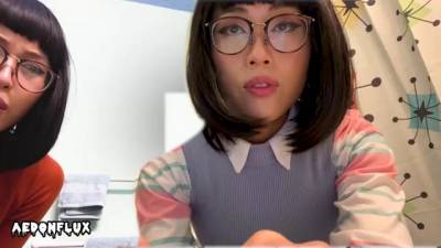 Nerdy Asian girls, Velma and Dr. Fujita are posing and teasing in front of the camera - sunporno.com