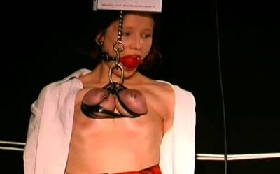 Naked wife stands fastened up and endures breast thraldom - icpvid.com