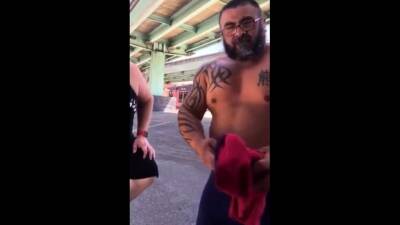 Master and his hubby after their workout in the parking lot. - nvdvid.com