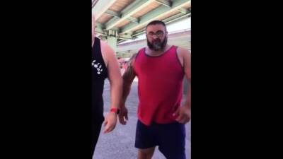 Master and his hubby after their workout in the parking lot. - nvdvid.com