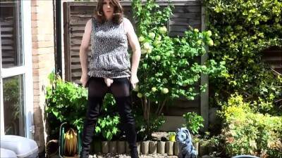 Sexy masturbating crossdresser in thigh boots outdoors - nvdvid.com