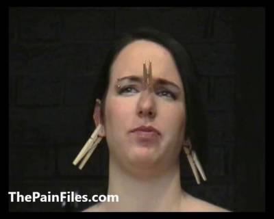 Impressive brunette takes a lot of pain while in submission - bdsm.one