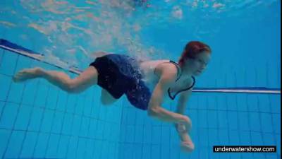 Teen girl Avenna is swimming in the pool - ah-me.com