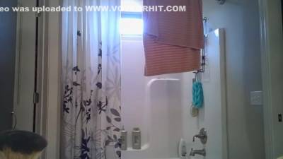 Busty Woman Gets Spied On In Her Bathroom Going For A Shower - voyeurhit.com