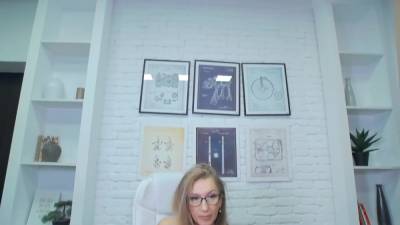 Mature boss is masturbating in her office - hclips.com