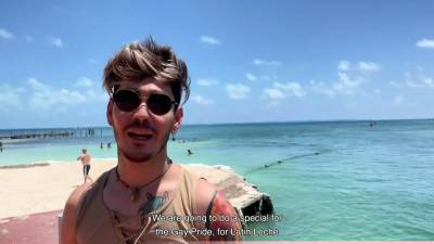 Latin guys celebrate gay pride on the beach outdoor - icpvid.com