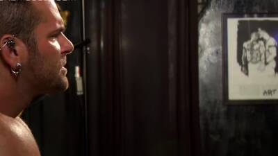 Muscular guys tie each other up with ropes and chains - nvdvid.com