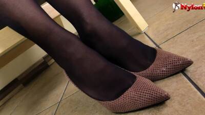 Hot Mistress in nylons giving footjob - nvdvid.com
