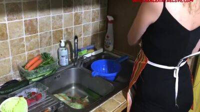 In The Kitchen. Prepares A Nice Dinner - hclips.com