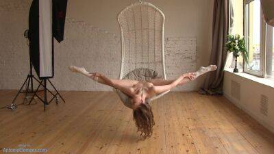 Flexible Beauty Ballerina Playfully Poses For Me In A Hanging Chair, Moving Her Long Legs Wide. 4 Of 6 - hclips.com