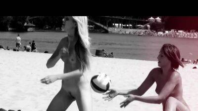 Stunning young nudist babes relax at the beach - drtuber.com