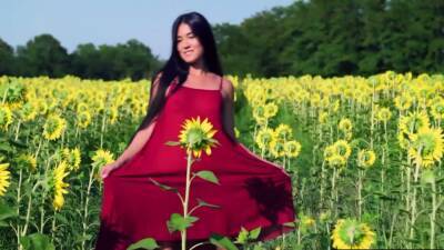 Hot mongolian babe stripping on a meadow - nvdvid.com