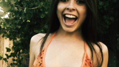 Free Video and Pictures of Curly Haired Schoolgirl Stripper - hotmovs.com