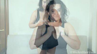 Ramira strokes her hairy pussy on her chair - hotmovs.com