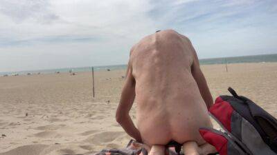 Dildo anal insertion on public beach - voyeurhit.com