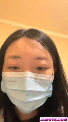 An Asian woman is seen urinating on hidden camera in a public washroom. - txxx.com - China