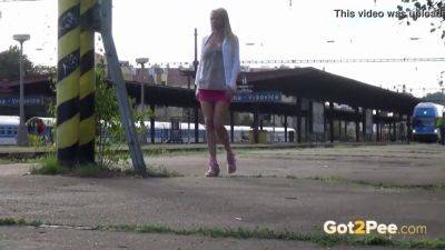 Blonde teen desperate for some golden shower in public train station - sexu.com - Czech Republic