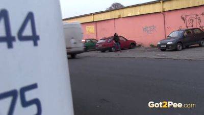 Watch this slutty babe pee in public while getting caught! - sexu.com