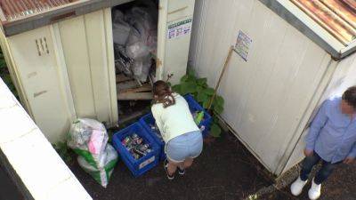 IH2301-A married woman who cleans the garbage dump is molested from behind and moans - txxx.com