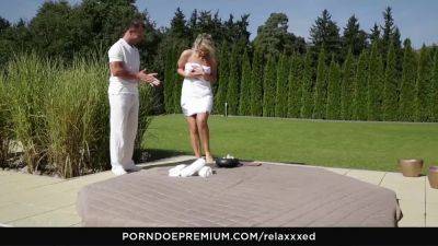 Blonde beauty sensually massaged outdoors for her erotic desires - sexu.com