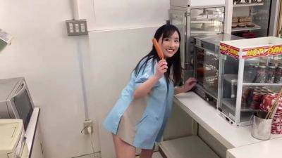 07235 Beautiful girl clerk inside the store - upornia.com