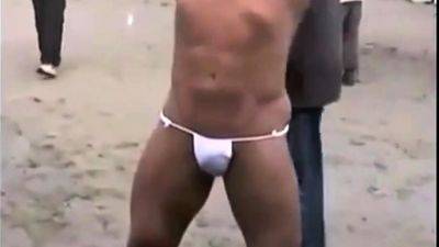 Muscled Asian Stud Bares Almost All at the Beach - drtuber.com