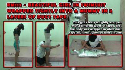 Beautiful Girl In Swimsuit Wrapped Tightly Into A Mummy In 2 Layers Of Duct Tape - txxx.com - Malaysia