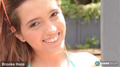 Brooke Haze - Brooke Haze models her new string bikini in an outdoor shower. She's tiny and horny as hell. - hotmovs.com