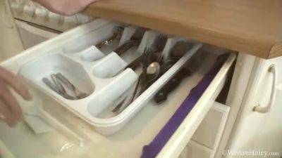 Nomi is using her favorite utensil in the kitchen - WeAreHairy - hotmovs.com