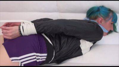 Get 2 Archive Videos With Mara Bound And Gagged In Her Shiny Nylon Shorts - hotmovs.com