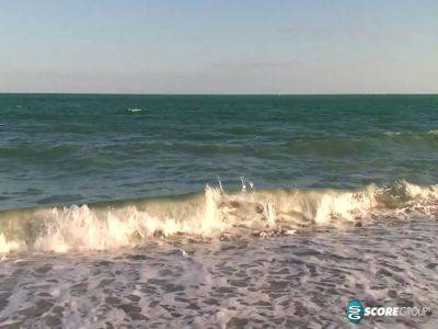 Ashlyn Lee goes fishing, but she would rather enjoy a masturbation session on the sand. She gets caught on-camera by our voyeur videographer. - sexu.com