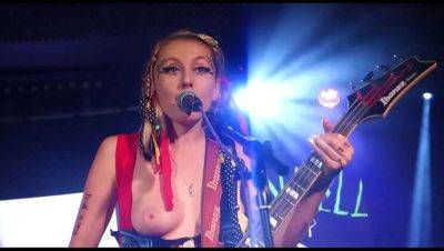 Sexy Female Rocker Flashes Her Tits On Stage - Wardrobe Malfunction - xxxfiles.com