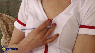 British Nurse Fire Girl Is A Skinny Cougar Who Loves To Play With Her Shaved Pussy - MatureNl - hotmovs.com - Britain