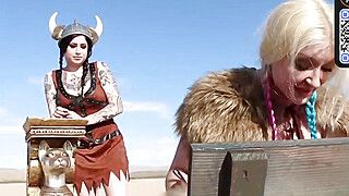 A blond woman with immense knockers in Viking garment gets an ass-fuck trophy in the desert - ah-me.com