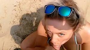 Big breasted blonde milf sucking and fucking on the beach - hdzog.com