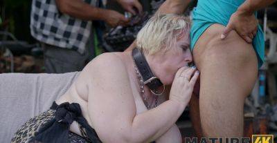 A pale slave gets fucked on the table outdoors - alphaporno.com