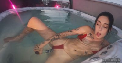 A sexy girl has sex with herself in the jacuzzi using a dildo - alphaporno.com