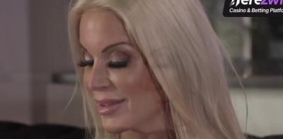 Blonde housewife with phat hooters lies on sofa - ah-me.com