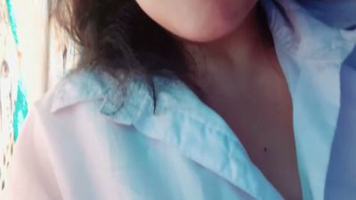 Young woman in white blouse films herself touching her Brazilian waxed pussy by the apartment window - yesvids.com - Brazil