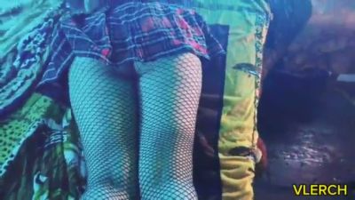Young Latina otaku teases in fishnets and plaid under blue neon light - yesvids.com