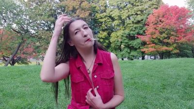 Gypsy Dolores bares it all in a red shirt while smoking in an autumn park - yesvids.com