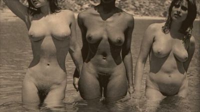 Vintage trio of hairy interracial lesbians pose nude at the beach - yesvids.com