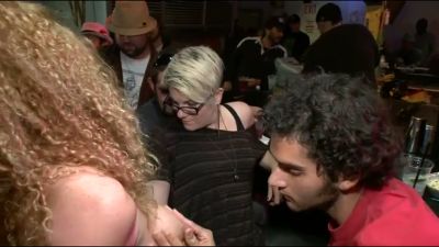 Bound blonde in yellow dress serves oral in a dimly lit fetish bar - yesvids.com