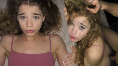 Curly-haired college girl takes cumshot deep in her mouth on a dimly lit bed - yesvids.com
