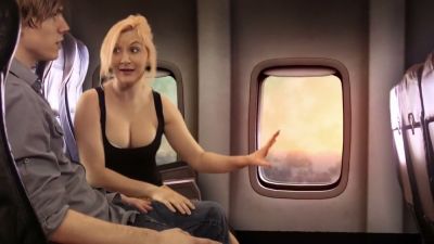 Blonde passenger gives a discreet handjob on a sunset flight - yesvids.com
