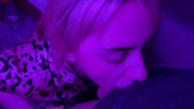 Amateur chokes deep on a large cock under purple lights - yesvids.com