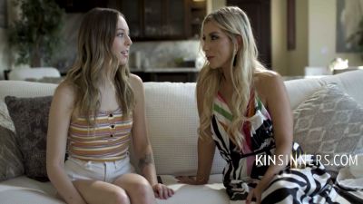 Blonde and brunette lovers heat up on a white couch in a modern living room - yesvids.com