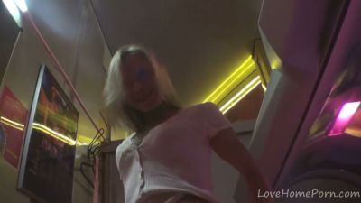 Blonde solo girl spreads wide in a glowing public tanning bed - yesvids.com